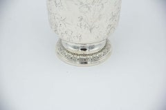 Silver cup with engraved floral motifs