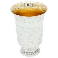 Silver cup with engraved floral motifs