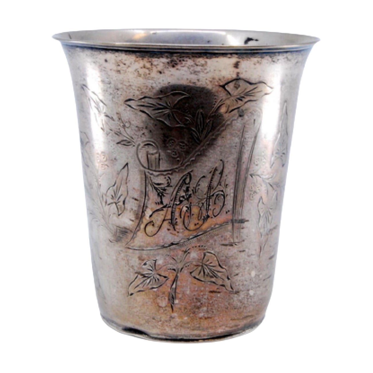 Silver cup with engraved floral motifs surrounding the card