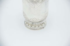 Silver cup with floral motifs