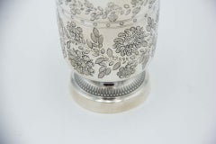 Silver cup with floral motifs