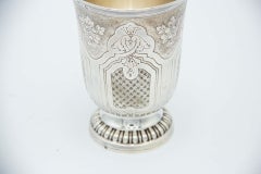 Silver cup with floral motifs
