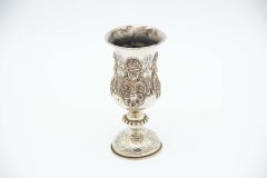 Silver cup with floral motifs