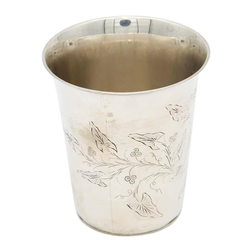 Silver cup with floral motifs