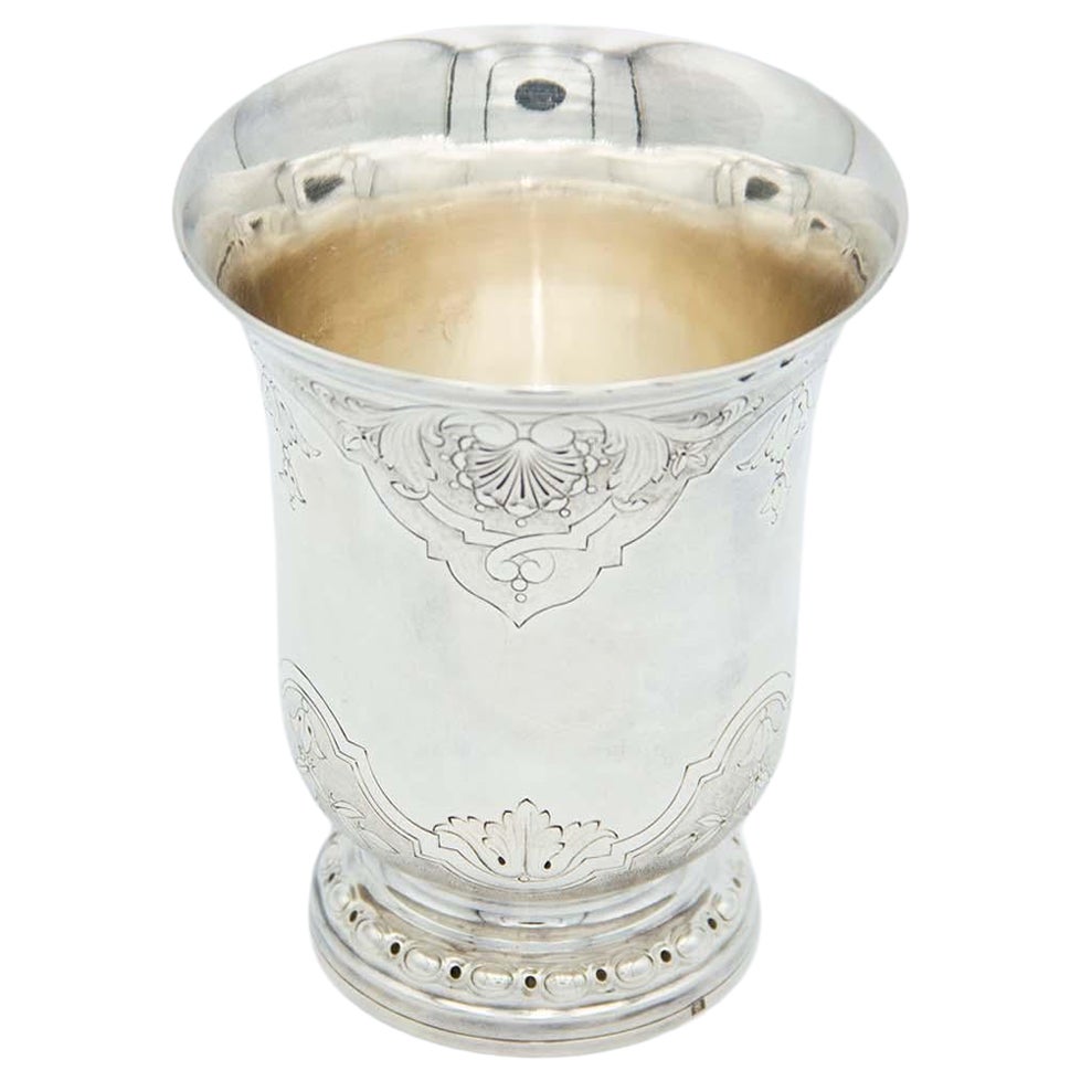 Silver cup with floral motifs