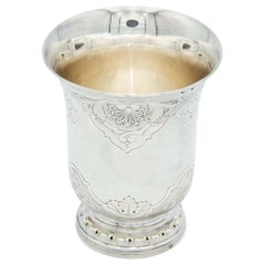 Silver cup with floral motifs