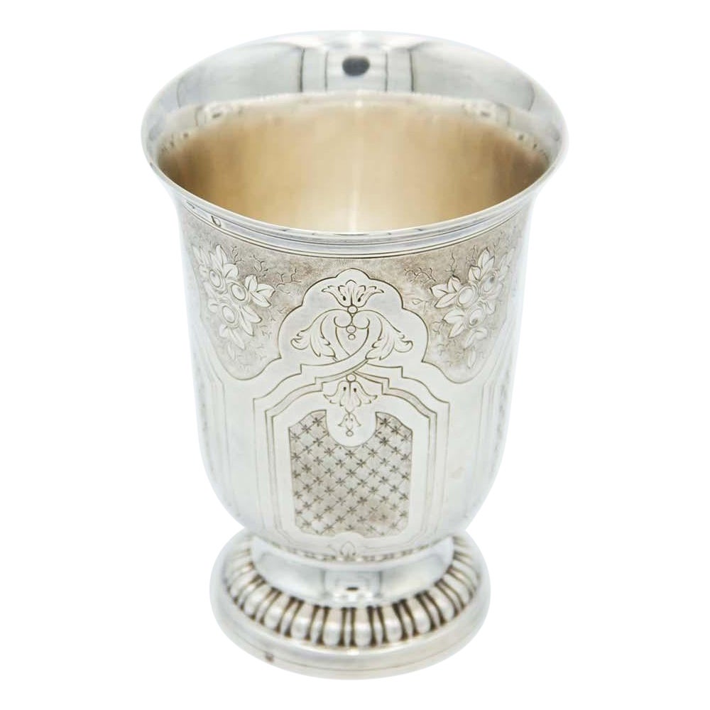 Silver cup with floral motifs