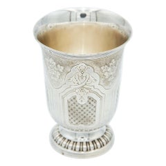 Silver cup with floral motifs