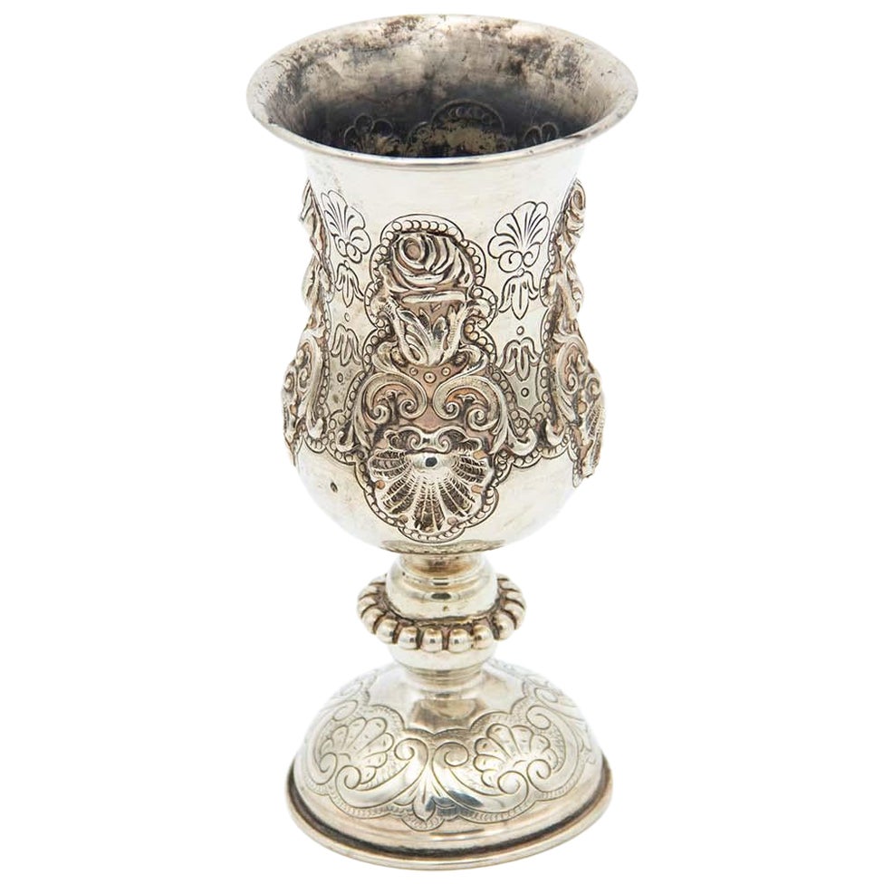 Silver cup with floral motifs
