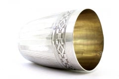 Silver cup with Greek friezes and raised bands at the top