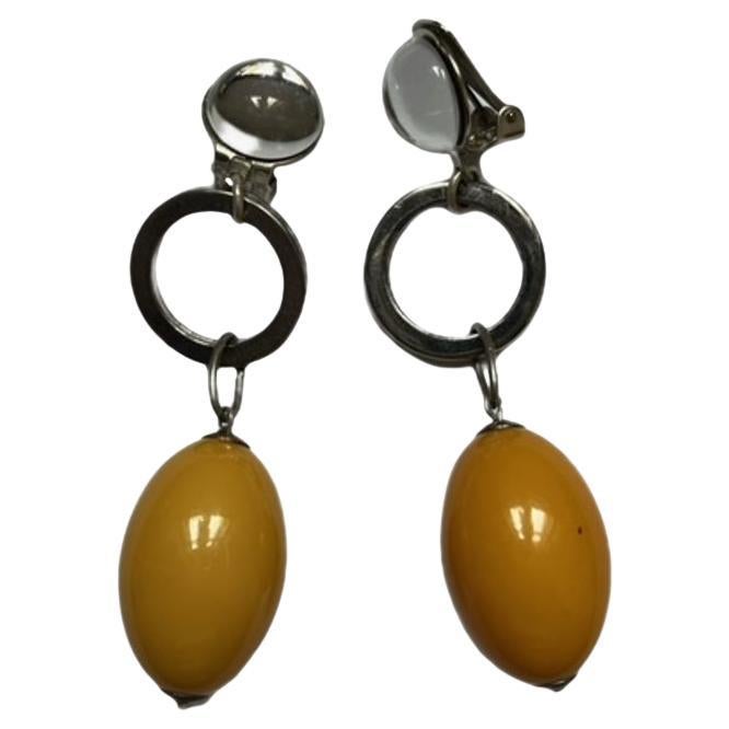 Silver Dangling Clip-on Earrings with Yellow Bakelite Pendant by Roger Scemama im Angebot