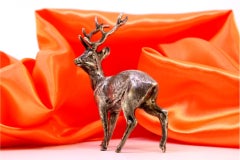 Silver deer in perfect relief and applications