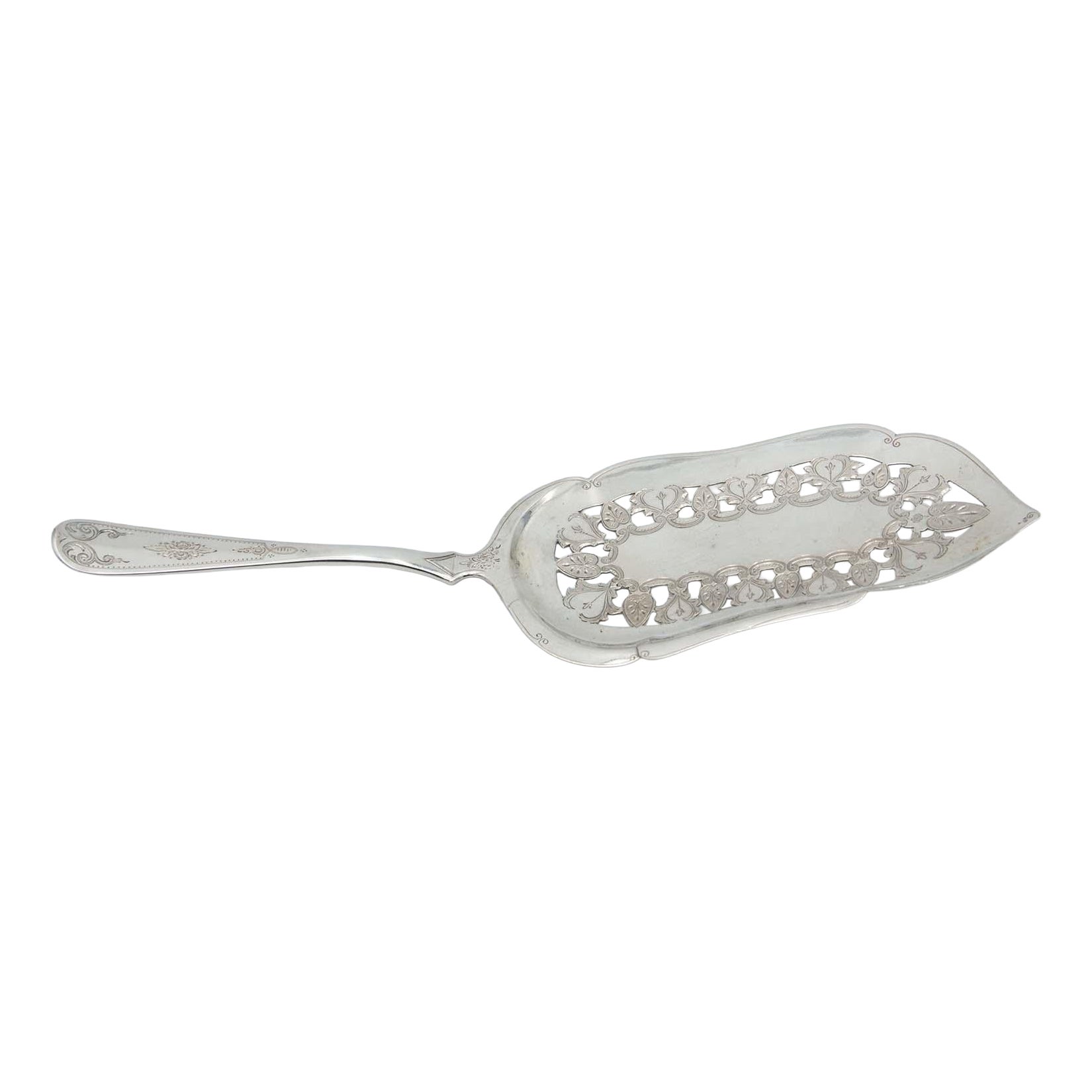 Silver dessert spatula with cutouts