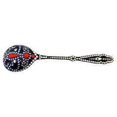 Silver dessert spoon with gold cloisonné shell in Russian style