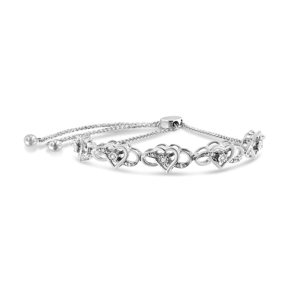Express your affection to her with this dazzling bolo bracelet. It is crafted of sterling silver and features a multitude of interlocking heart and infinity accents that are adorned with sparkling round cut diamonds. It comes with a bolo clasp that