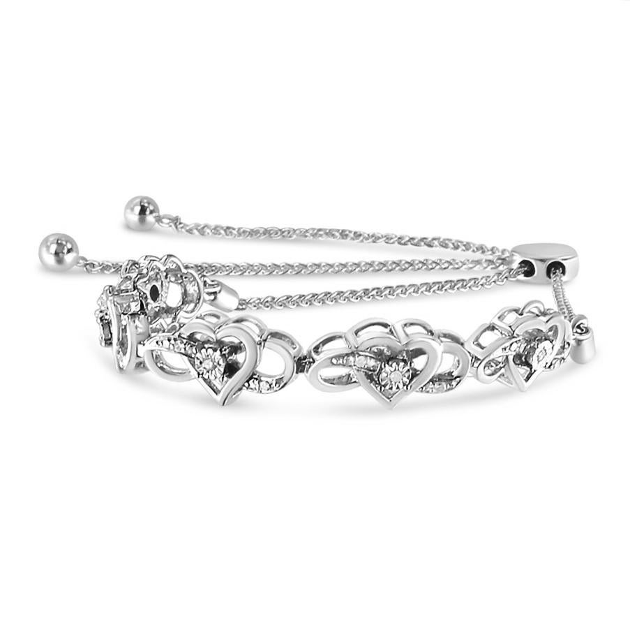 Contemporary Silver Diamond Accent Interlocking Infinity and Heart Tennis Bolo Bracelet For Sale