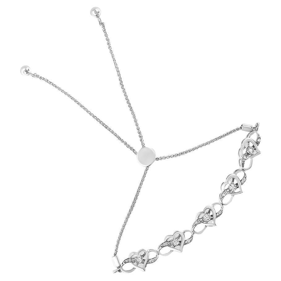 Silver Diamond Accent Interlocking Infinity and Heart Tennis Bolo Bracelet For Sale