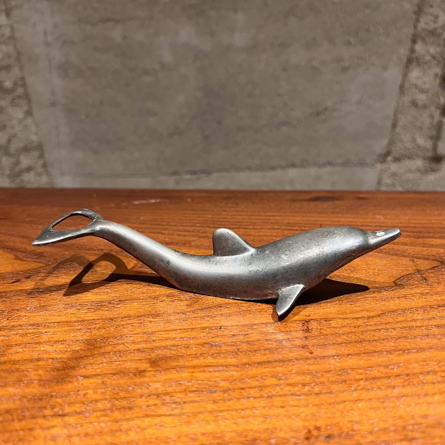 
Silver Plate Dolphin Bottle Opener
Midcentury Mad Barware
2 h x 6.5 long x 2.38 w
Original vintage condition unrestored
Refer to images.