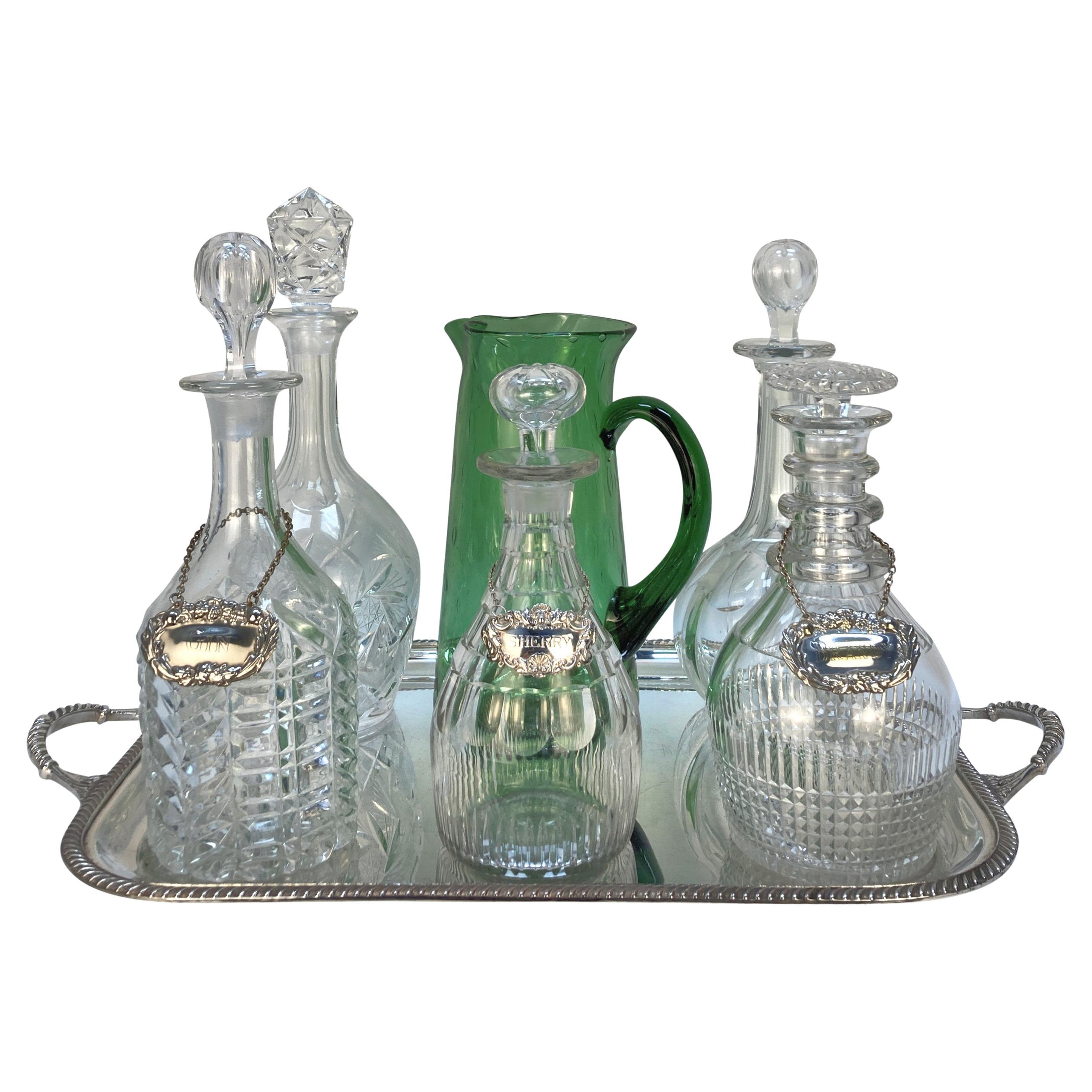 Silver Drinks Tray With Five DEcanters
A Green Water Jug