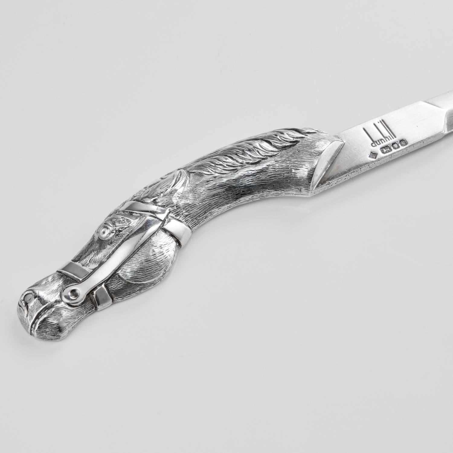An impressive quality Silver Dunhill letter opener with an intricately carved horses head on one end. The shape of the horse head is curved wonderfully which can create a handle shape.

The piece is signed & dated on the upper side - London,