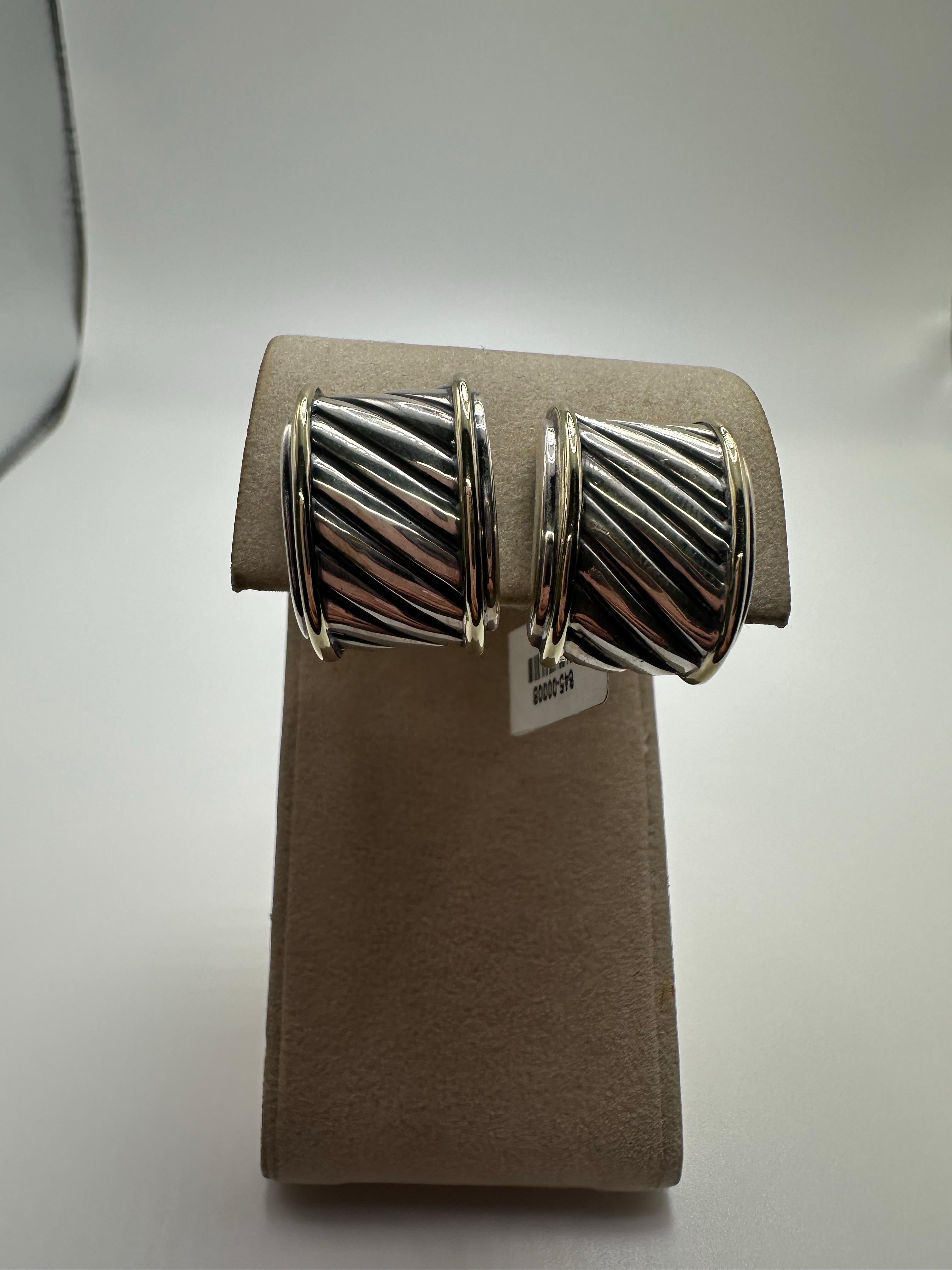 Stunning modern earrings by David Yurman made in silver. Earrings have omega closure on the back! The outer parts are plated with yellow gold for extra style!

WHAT YOU GET AT STAMPAR JEWELERS:
Stampar Jewelers, located in the heart of Jupiter,