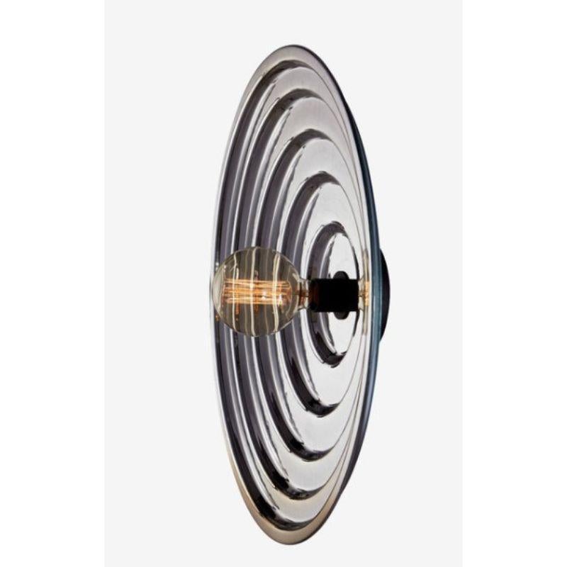 Silver Echo ceiling light, large by RADAR
Design: Bastien Taillard
Materials: Thermoformed silver glass, metal.
Dimensions: H 20 x D 70 cm

Also available: In gold, and size Small (Diameter: 40), Wall base available in black metal or solid