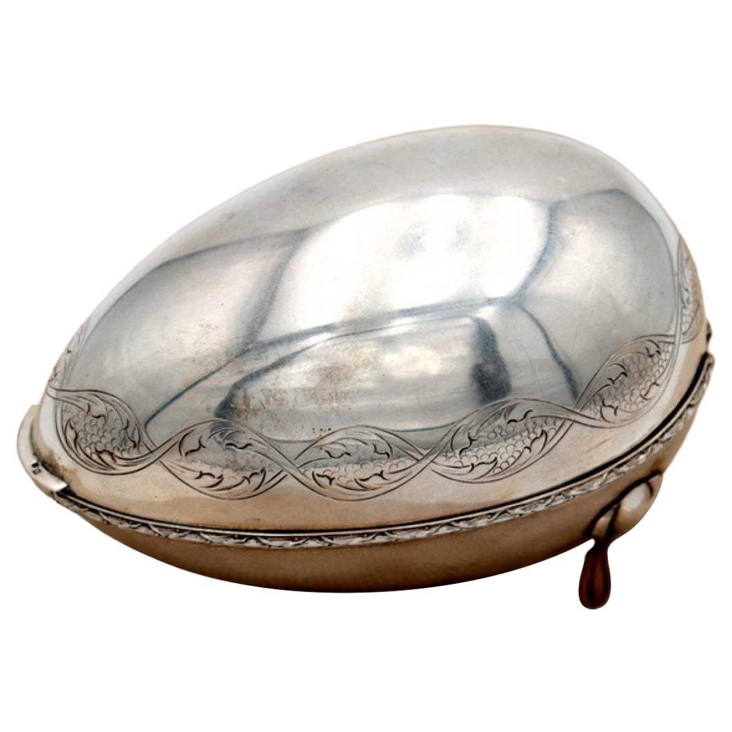 Silver egg-shaped soap dish