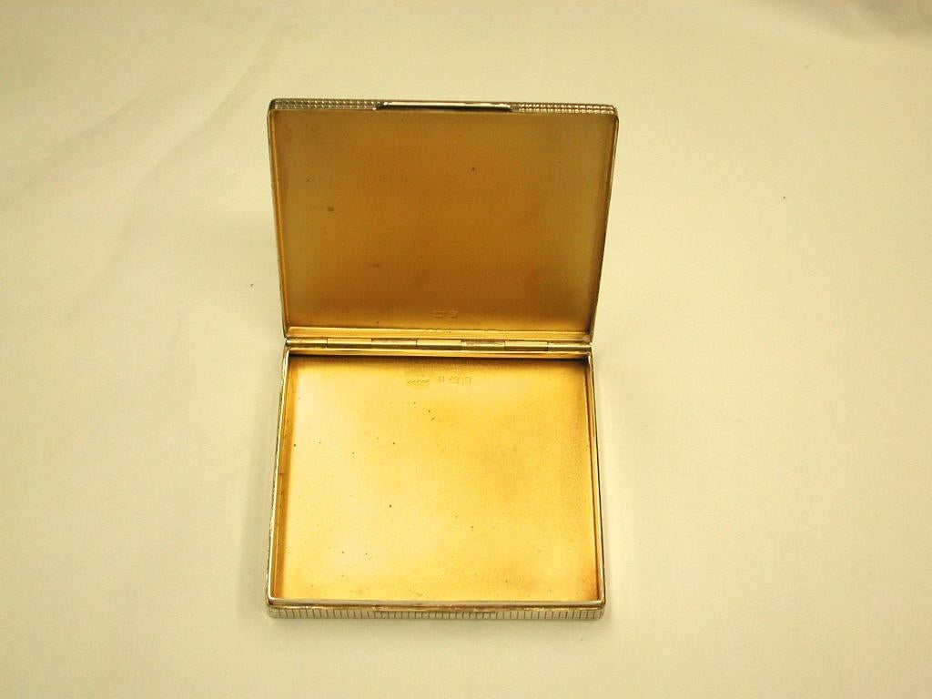 Silver Engined -Turned box, dated 1954,
Made by Harman Brothers of Birmingham, who were specialist silver box makers.
Heavy gauge silver box with gilt interior.
The hinge is integral and flush which is a sign of quality
This box could have been