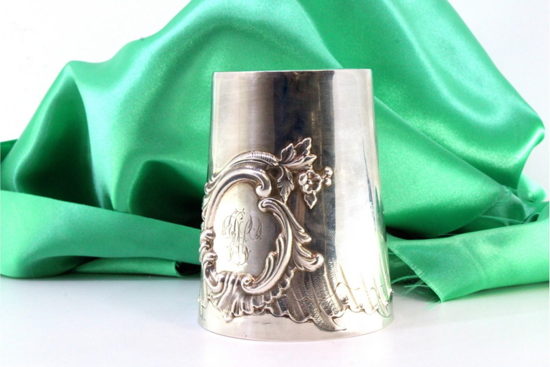 Description: Silver evening cup with reliefs and monogram card. Metal: Silver. Origin: French. Brand: Tête Minerve. Weight: 106.35 grams. Dimensions: 7cmx9cm. Content: 950/1000. Assay Mark: Yes, since 1838. Additional information: Good condition.