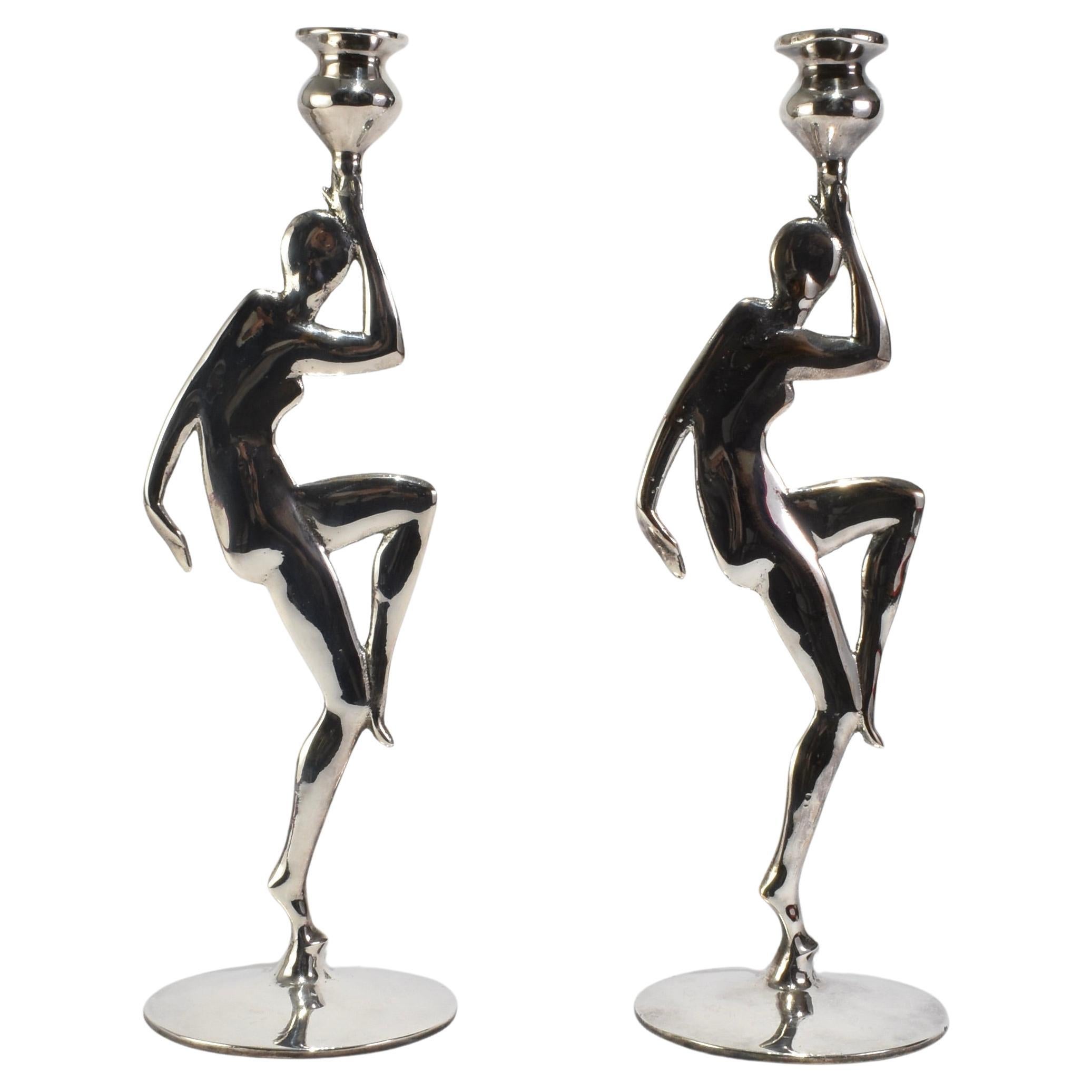 Portacandele figurati in argento in vendita