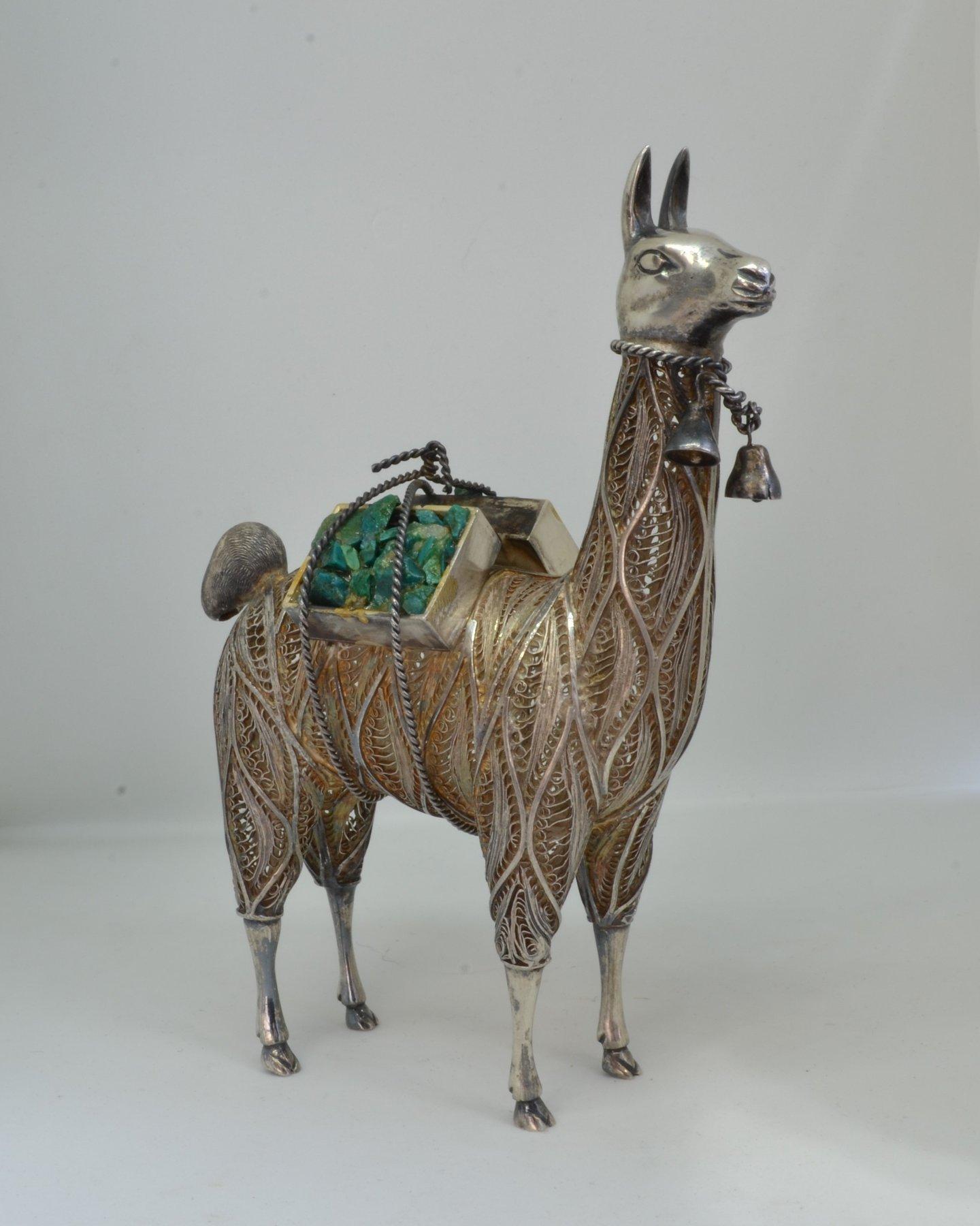 Sterling 925 silver Llama ornament
Good looking and well made figure with lots of charm!

Independently verified as 925 purity silver

Rough gemstones in boxes (possibly rough turquoise?)

Acquired in Japan however original provenance is not