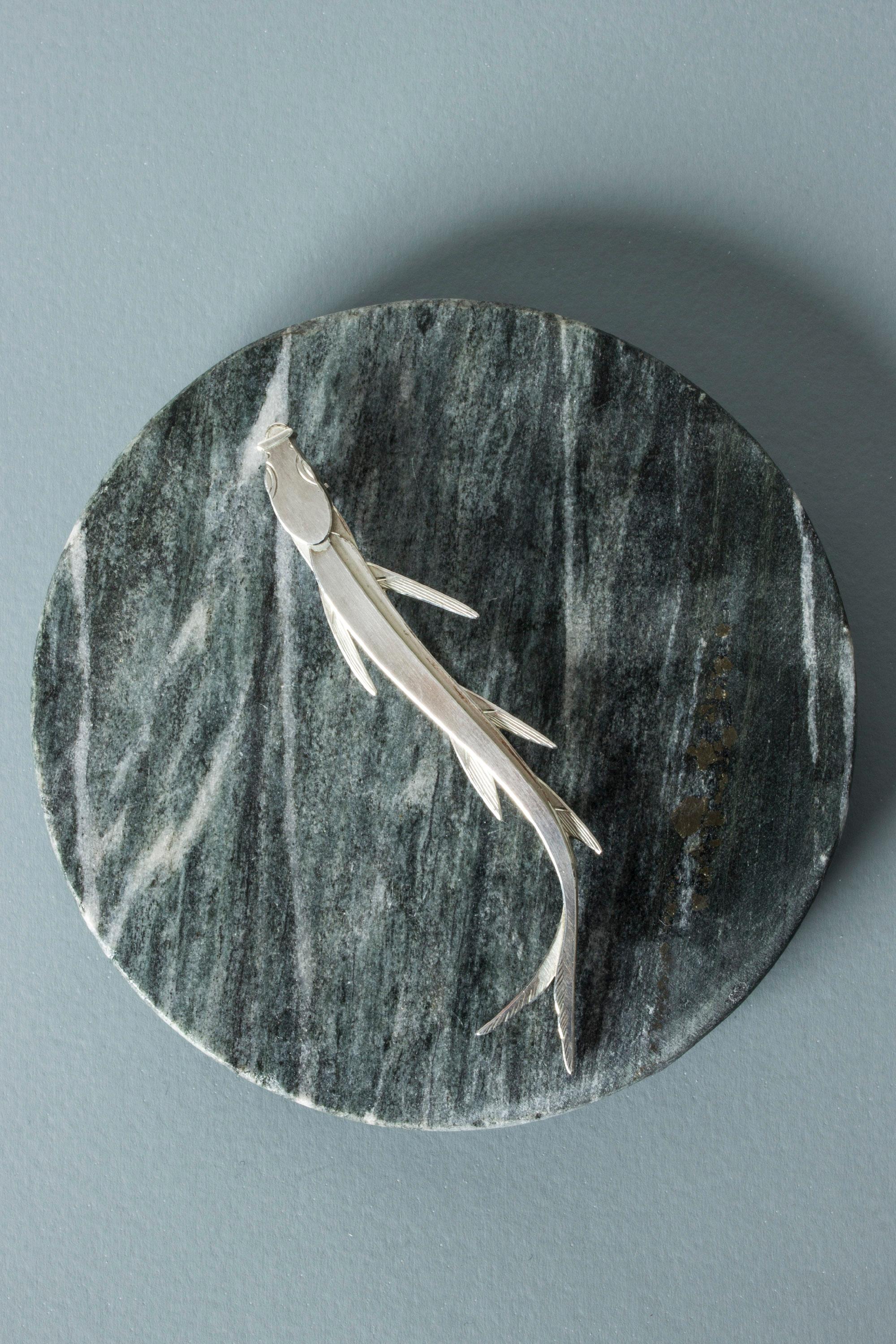 Striking silver brooch by Wiwen Nilsson, in the form of a fish. Geometric design, meticulously executed. Beautiful movement.