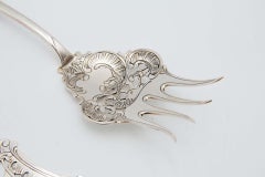 Silver fish fork and spatula set with cutouts