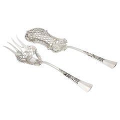 Silver fish fork and spatula set with cutouts Silver fish fork and spatula set with cutouts