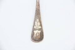 Silver fish fork with cutouts