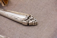 Silver fish knife and fork with engraving and raised handles