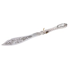 Silver fish knife with scalloped blade