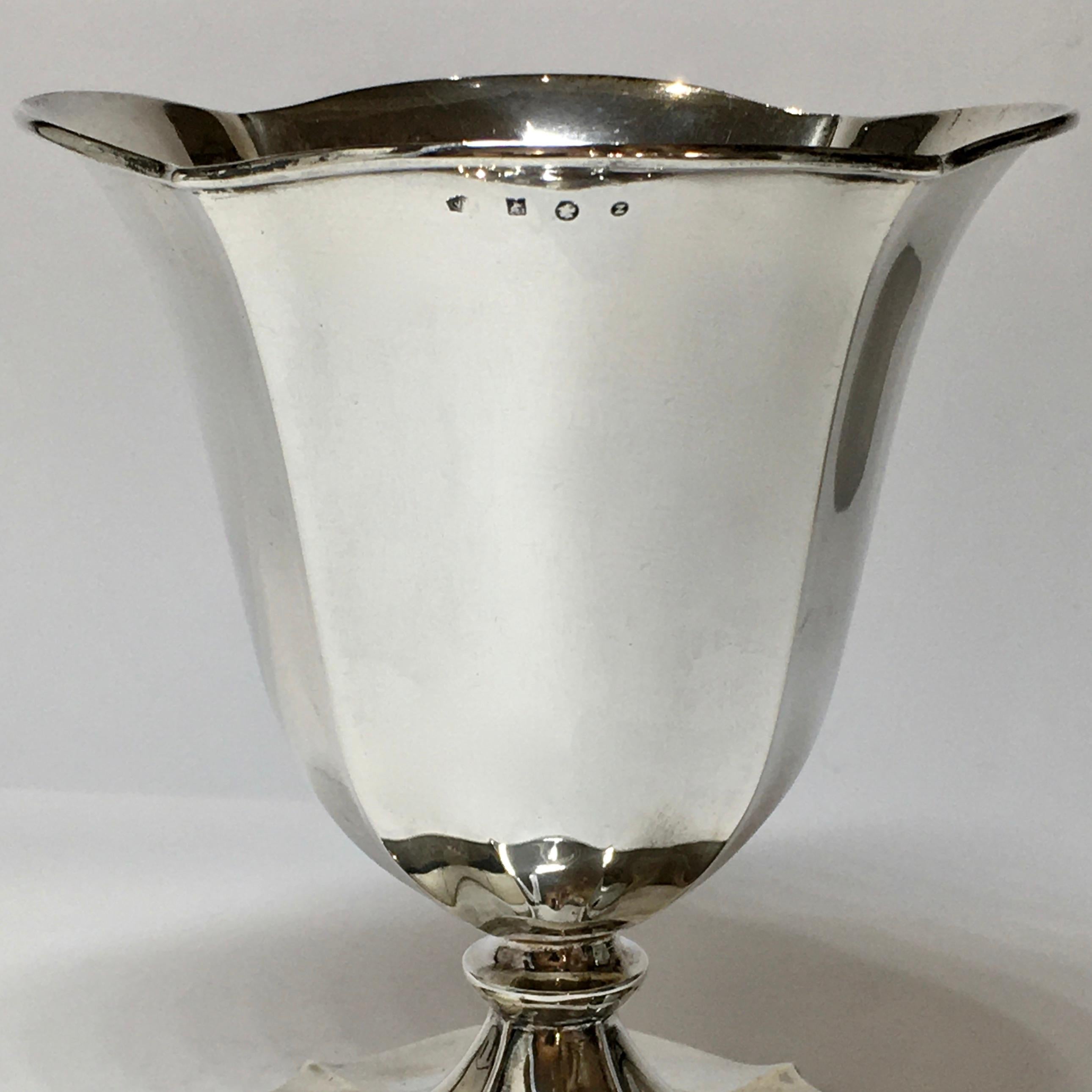 Silver Flower Vase, manufactured in 1934 by Van Kempen, Zeist, The Netherlands

Van Kempen is a well-known Dutch Gold and Silver Factory in Zeist / Voorschoten. The maker's mark is a large G with the vk in the contour of the G.

When Antonius
