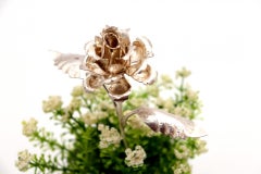 Silver flower with applications