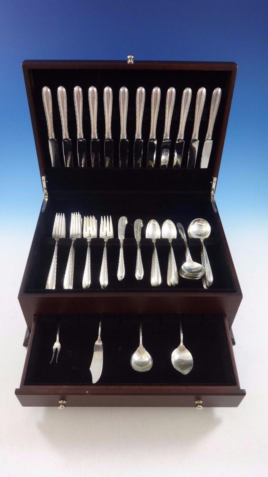 SILVER FLUTES BY TOWLE Set di posate in argento sterling - 76 pezzi. Questo set comprende:
12 COLTELLI, 9