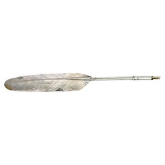 Silver fountain pen in the shape of a feather with reliefs