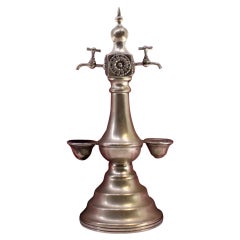Silver fountain-shaped toothpick holder