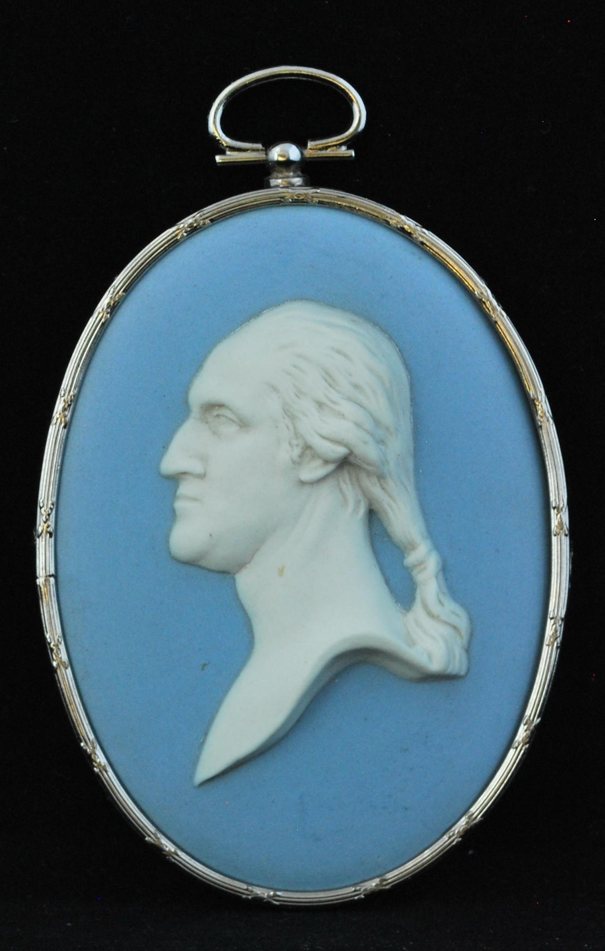 A portrait medallion of George Washington, in pale blue jasperware, and set in a quality frame of silver, reeded and cross-banded. Decorated by Bert Bentley, one of the best of the early 20th century decorators at Wedgwood.

This profile portrait of