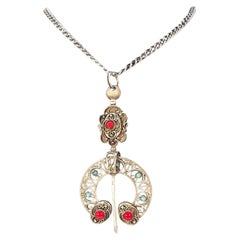 Antique Silver French penannular brooch set with cabochons of red coral and turquoise