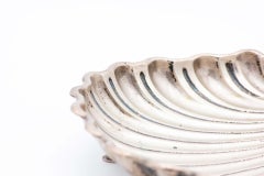 Silver fruit bowl in the shape of a shell