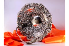 Silver fruit bowl w/ shell reliefs & floral motifs surrounding monogram cards