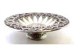 Silver fruit centerpiece with tall base, heart shells and circular frieze