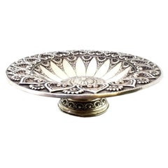 Silver fruit centerpiece with tall base, heart shells and circular frieze