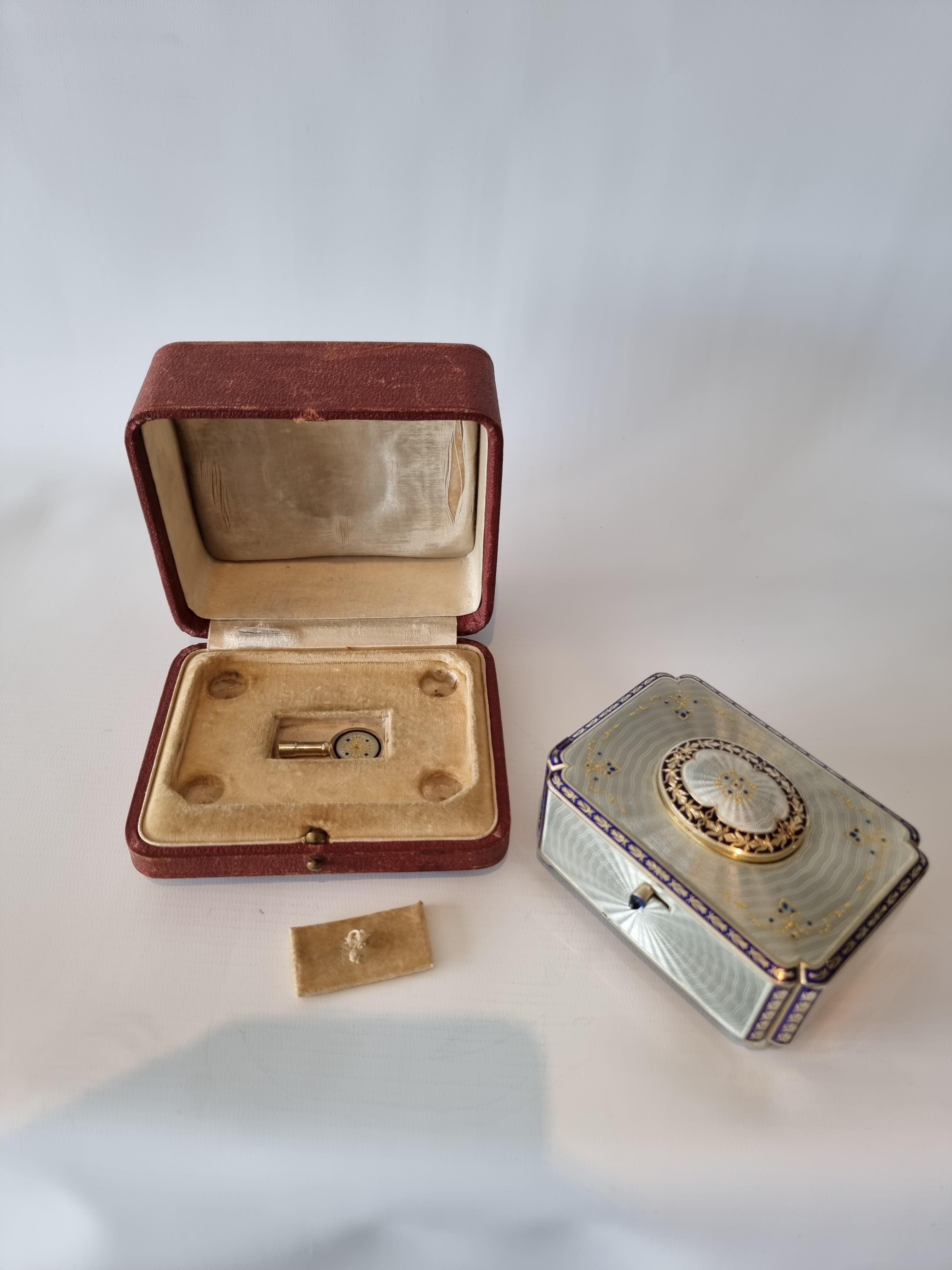Austrian Silver Gilt and Full Radial Guilloche Enamel Singing Bird Box with Original Key For Sale