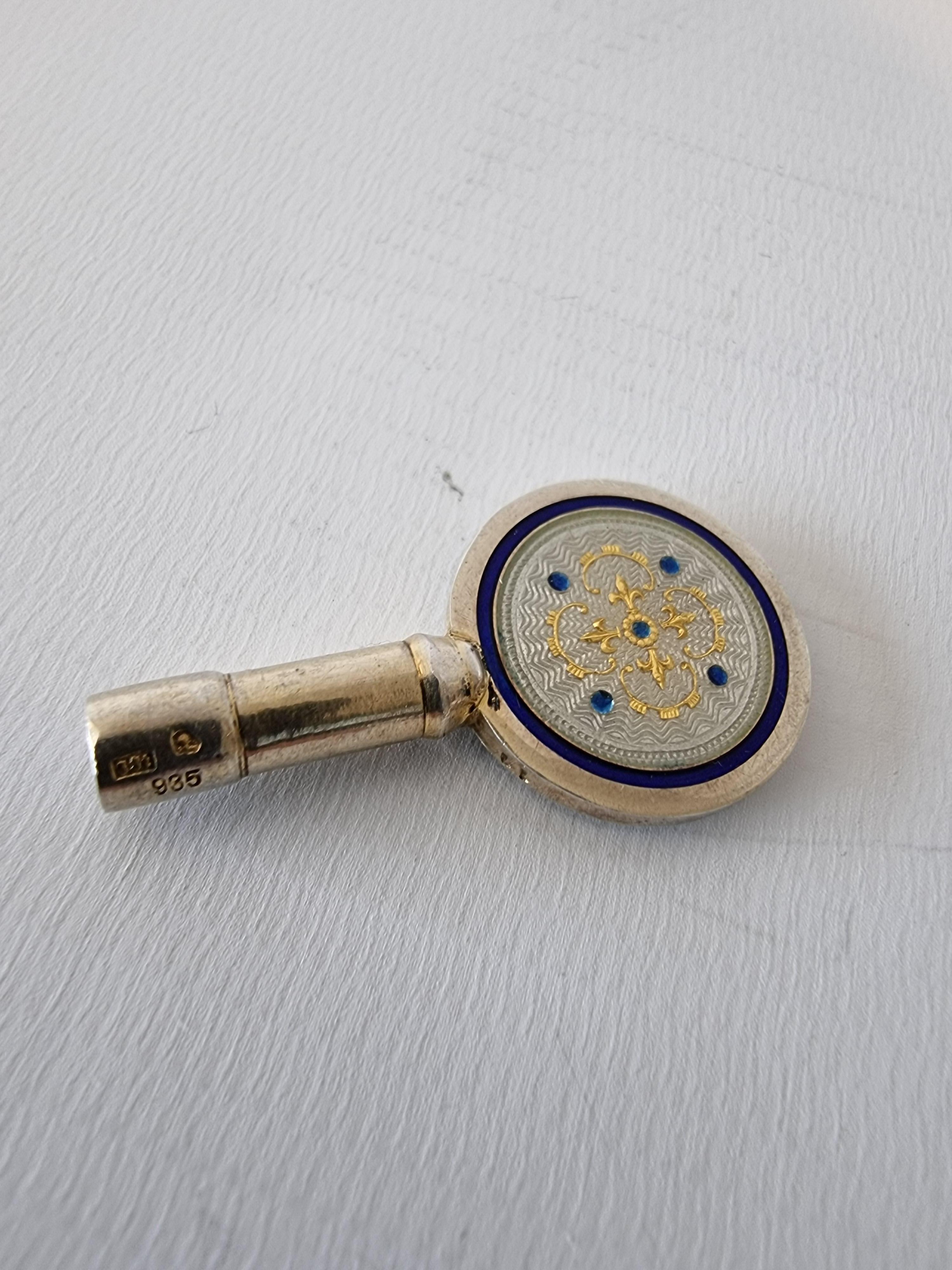 Early 20th Century Silver Gilt and Full Radial Guilloche Enamel Singing Bird Box with Original Key For Sale